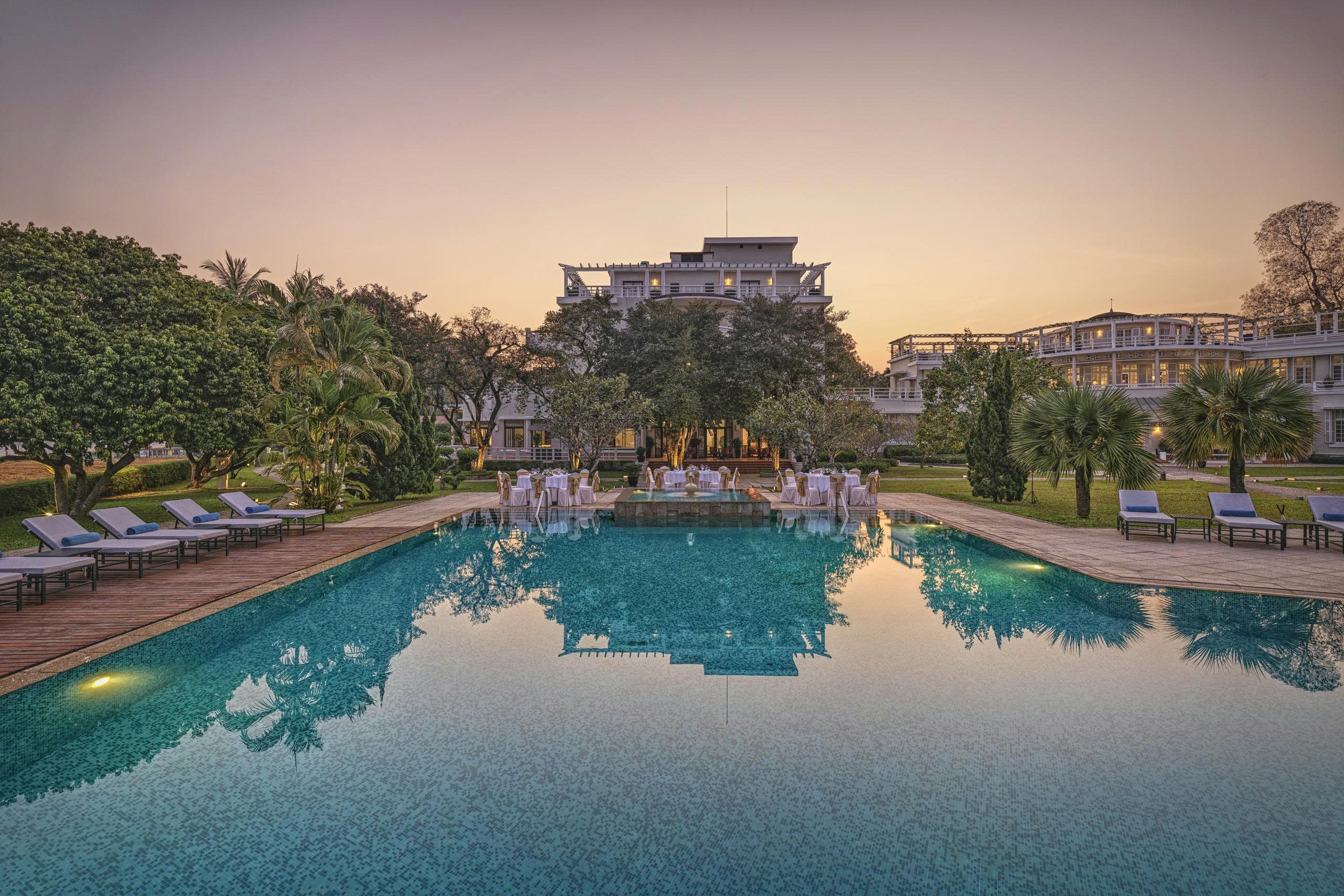 Pool and hotel building — Azerai La Residence Hue